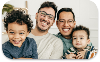 group of 4 people smiling